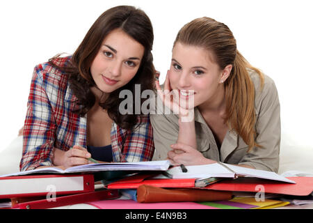 Two girls revising together Stock Photo