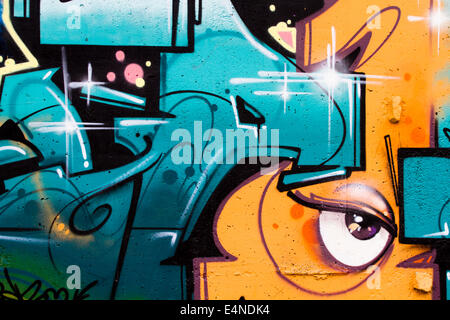 typography and color lines, segment of an urban grafitti on wall Stock Photo