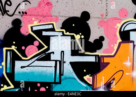 typography and color lines, segment of an urban grafitti on wall Stock Photo