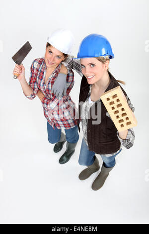 Female bricklayers Stock Photo
