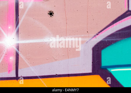 typography and color lines, segment of an urban grafitti on wall Stock Photo