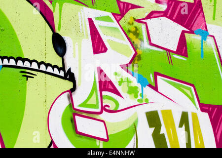 typography and color lines, segment of an urban grafitti on wall Stock Photo