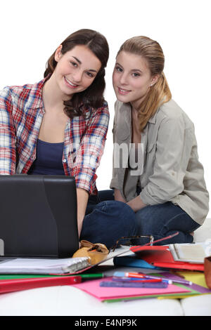 Two female students revising together Stock Photo