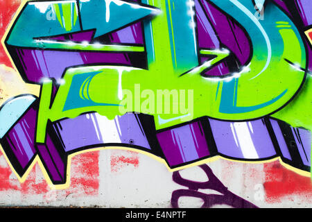 typography and color lines, segment of an urban grafitti on wall Stock Photo