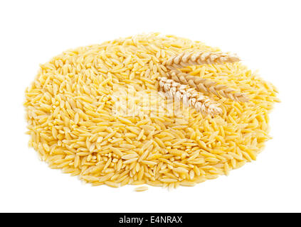 Heap of dried durum wheat, also hard wheat or macaroni wheat, with wheat ears over white background Stock Photo