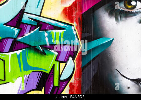 typography and color lines, segment of an urban grafitti on wall Stock Photo