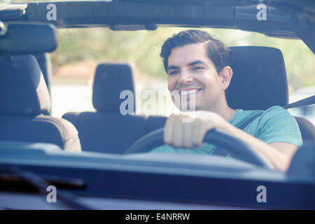 View of man driving car Stock Photo