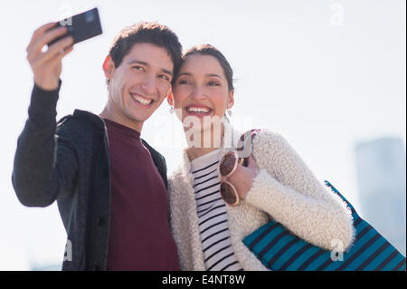 Young couple taking selfie Stock Photo