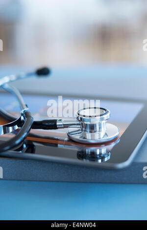 Close up view of stetoscope on digital tablet Stock Photo