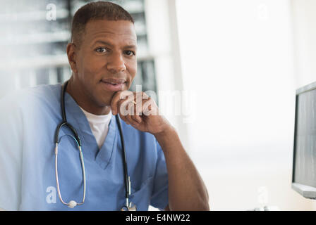 Portrait of male doctor in hospital Stock Photo