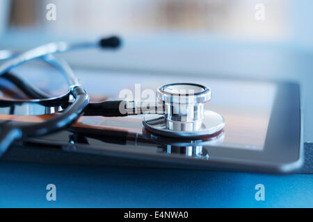 Close up view of stetoscope on digital tablet Stock Photo
