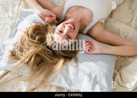 Portrait of woman waking up Stock Photo