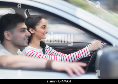 Young couple traveling in car Stock Photo