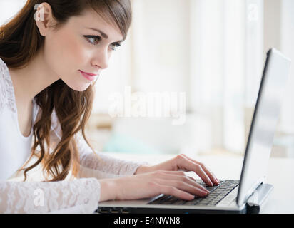 Young woman with laptop Stock Photo
