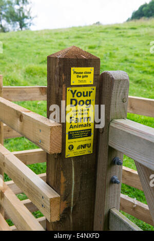 A notice informing dog owners to keep them on a lead so they don't scare farm animals in Hopesay, Shropshire, England. Stock Photo