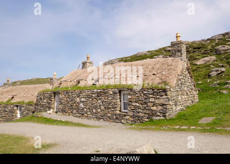 Crofts restored as a hostel in Na Gearrannan Blackhouse Village Garenin Isle of Lewis Outer Hebrides Western Isles Scotland UK Stock Photo