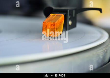 Vinyl record playing on a turntable, close-up Stock Photo