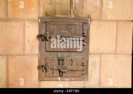 two closed old vintage rustic furnace doors Stock Photo