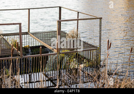 iron old dam in river Stock Photo