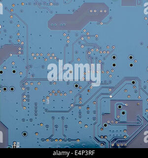 The back of a computer circuit board Stock Photo