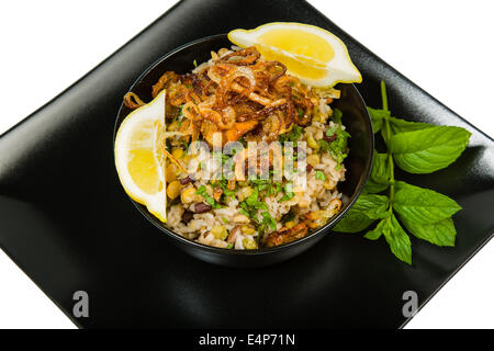 Mejadra is a traditional Arab dish of legumes and rice Stock Photo