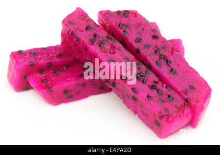 Close up of sliced dragon fruit over white background Stock Photo