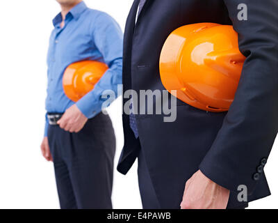 men with safety hats Stock Photo