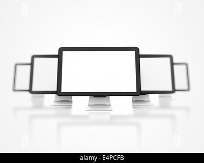 computer monitors on white background shallow depth of field Stock Photo