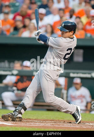 New York Yankees designated hitter Jacoby Ellsbury (22) flies out to center in the first inning against the Baltimore Orioles at Oriole Park at Camden Yards in Baltimore, MD on Sunday, July 13, 2014. Credit: Ron Sachs / CNP Stock Photo