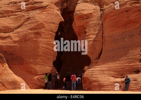 Tourists at entrance to Upper Antelope Canyon, near Page, Navajo Nation, Arizona, USA Stock Photo