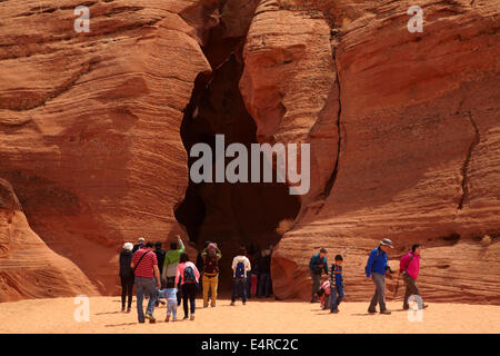 Tourists at entrance to Upper Antelope Canyon, near Page, Navajo Nation, Arizona, USA Stock Photo