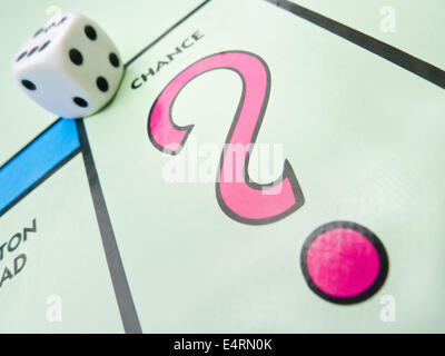 The 'CHANCE'  square on a monopoly board with a dice. Stock Photo