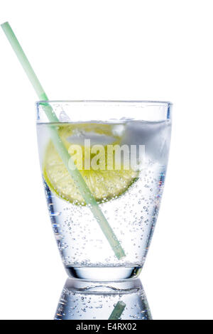 A glass with fresh drinking water and a lime. Mineral water as a Durstloescher., Ein Glas mit frischem Trinkwasser und einer Lim Stock Photo