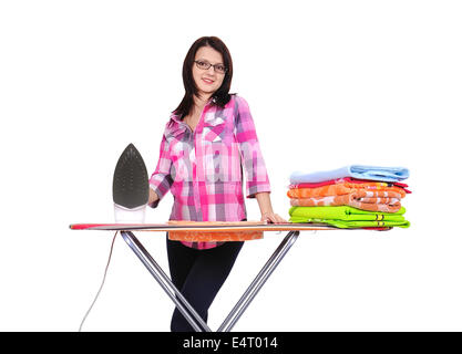 young beautiful woman ironing clothes on a white background Stock Photo