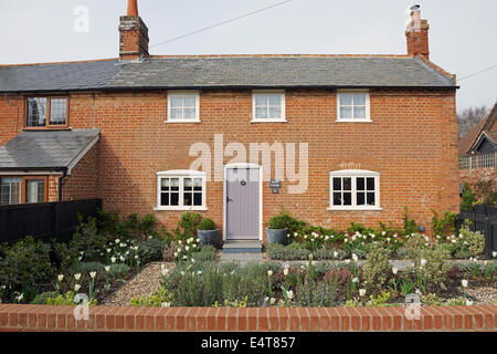 Traditional red-brick semi-detached cottage, Bawdsey, Suffolk, UK. Stock Photo