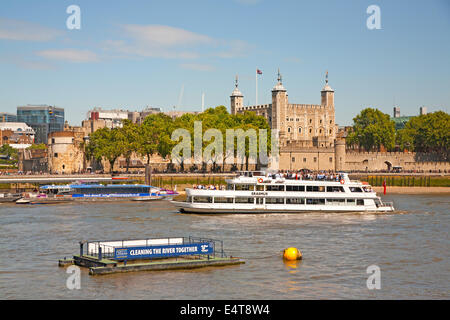 Cruise boats passing Tower of London on River Thames,London,UK Stock Photo