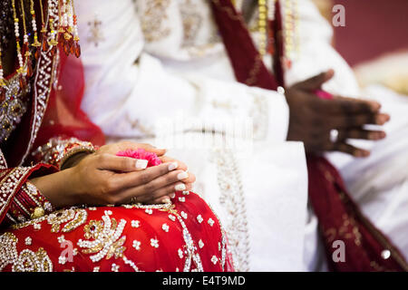 Close-up of Bride and Groom's Hands at Hindu Wedding Ceremony, Toronto, Ontario, Canada Stock Photo