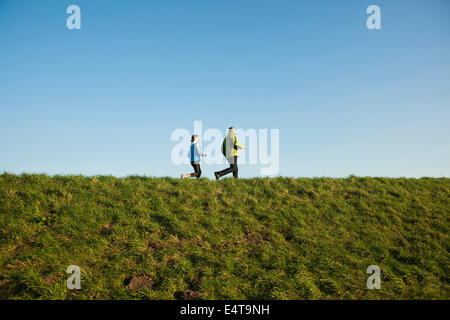 Man and Woman Jogging Outdoors, Baden-Wurttemberg, Germany Stock Photo
