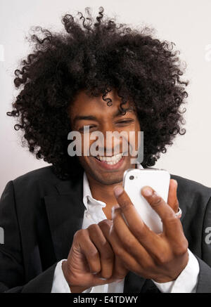Young Businessman using Smartphone Stock Photo