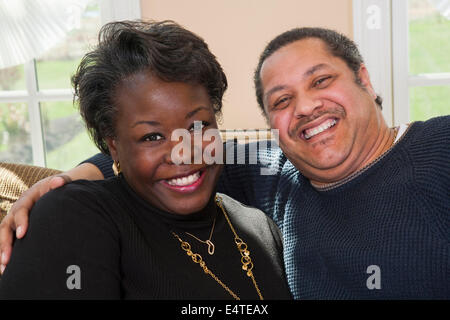 Portrait of Happy Mature Couple at Home Stock Photo