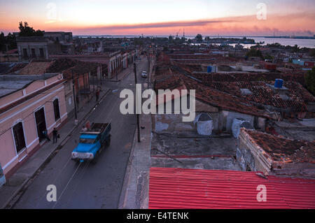 Overview of streets and rooftops of buildings at dusk, Cienfuegos, Cuba, West Indies, Caribbean, Central America Stock Photo
