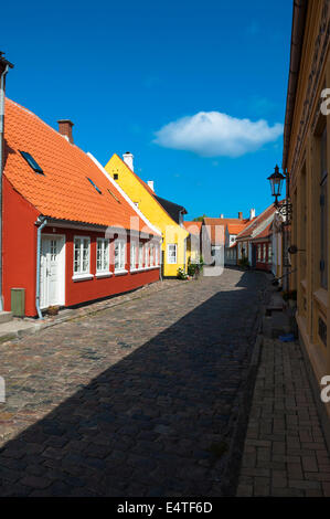 Typical painted houses and Cobblestone Street, Aeroskobing Village, Aero Island, Jutland Peninsula, Region Syddanmark, Denmark Stock Photo
