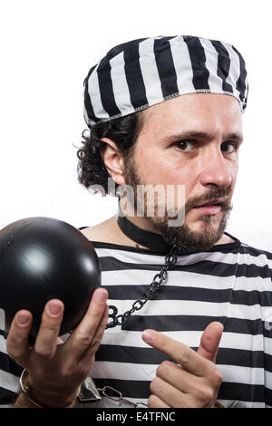 Solution, one caucasian man prisoner criminal with chain ball and handcuffs in studio isolated on white background Stock Photo