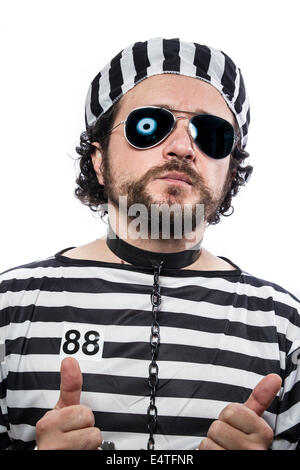 Prison, one caucasian man prisoner criminal with chain ball and handcuffs in studio isolated on white background Stock Photo