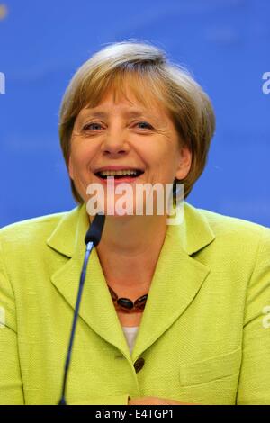 German Chancellor Angela Merkel smiles withe her award 'European of the ...