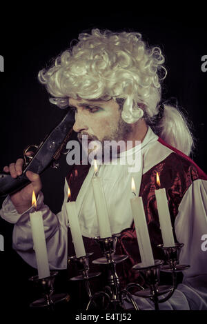 Gunfight, nineteenth century man, , chandelier with candles Stock Photo