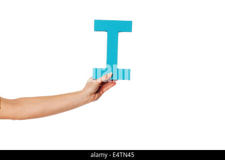 hand holding up the letter I from the left Stock Photo