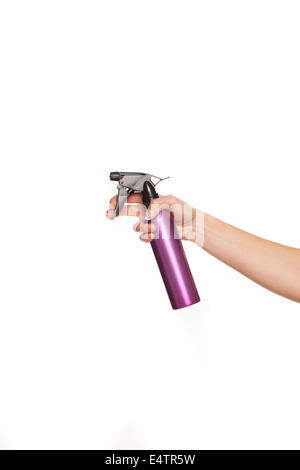 Female hand holding a spray can Stock Photo