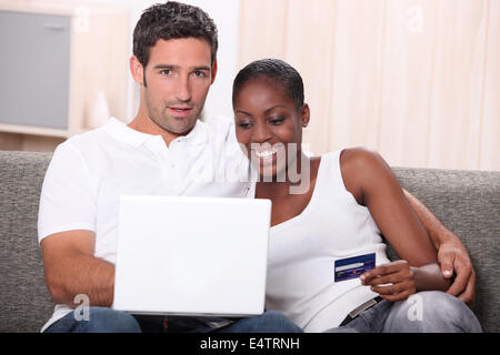 Couple buying on-line Stock Photo