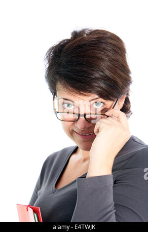 Woman peering over her glasses Stock Photo